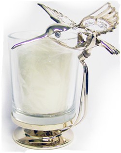 Candle holder hith  perched Hummingbird.
